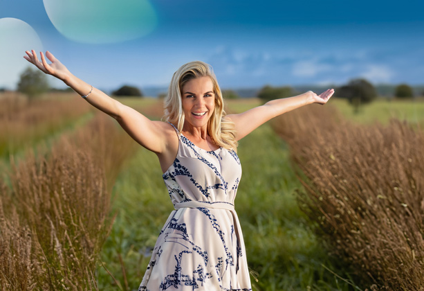 happy woman in field cadence psychology blog